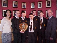 In the photgraph with Mr. D. McGovern (headmaster) and Miss F. Armstrong (Teacher in charge of quizzes) are Patrick McGuigan, David Matthews, Peadar Coyle, Paul Mathews and Colm O'Grady.