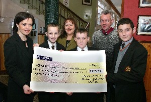 In the picture are Vincent O'Rourke, Ronan McDonald and Peter O'Hare who raised over 400, and Emmett Fearon, as they present a cheque for over 2000 to Fiona Stephens (Regional Development Officer) and Edel Rogan (Fundraising Manager).