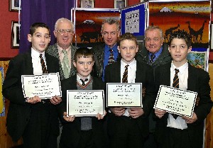 Kieran Jennings, Mark Smith, David Markey and Christopher Harte, present the cheque to Mr Paddy Mallon and Gerry Creaney. Also included is Dr Sean Fee - Teacher in charge of Charity Fund Raising.