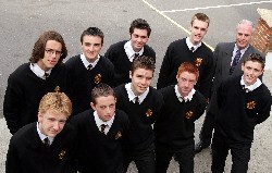 Mr. Dennot McGovern Headmaster congratulates the top achievers in this years GCSE examinations. Pictured are the nine boys that got at least 11 or more A grades. Included are Stephen Begley, David Boyle, Daniel Carroll, Steven Corcoran, Austin Donnelly, Donal Kane, Philip Knox, Sean McClorey and Kevin McManus.