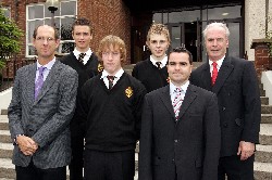 Mr Dermot Mc Govern, Headmaster congratulates the top achievers in this years GCSE examinations.  Four boys achieved an outstanding 11 A*/A grades or above.  Included are David Fitzpatrick, Michael Lynch and Christopher McAteer.  Also included are Vice Principals Mr Ronan Ruddy and Mr Paul OShea.  Missing from photograph is Cathal MacDhaibheid.
 